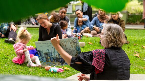 Children and families at a book reading